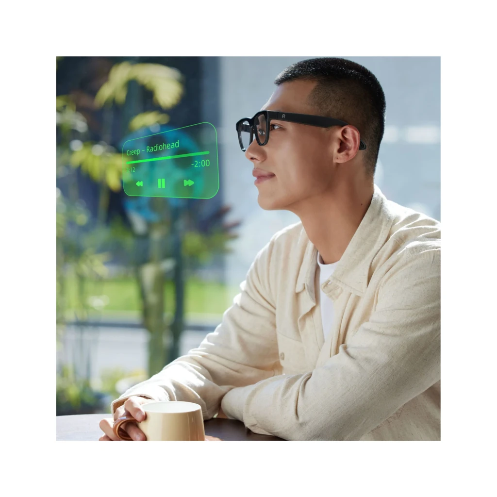 Rokid AI Glasses Negro con cámara 12MP, altavoces integrados y 4 micrófonos; montura negra elegante con patillas gruesas y lentes transparentes AR - Ítem8
