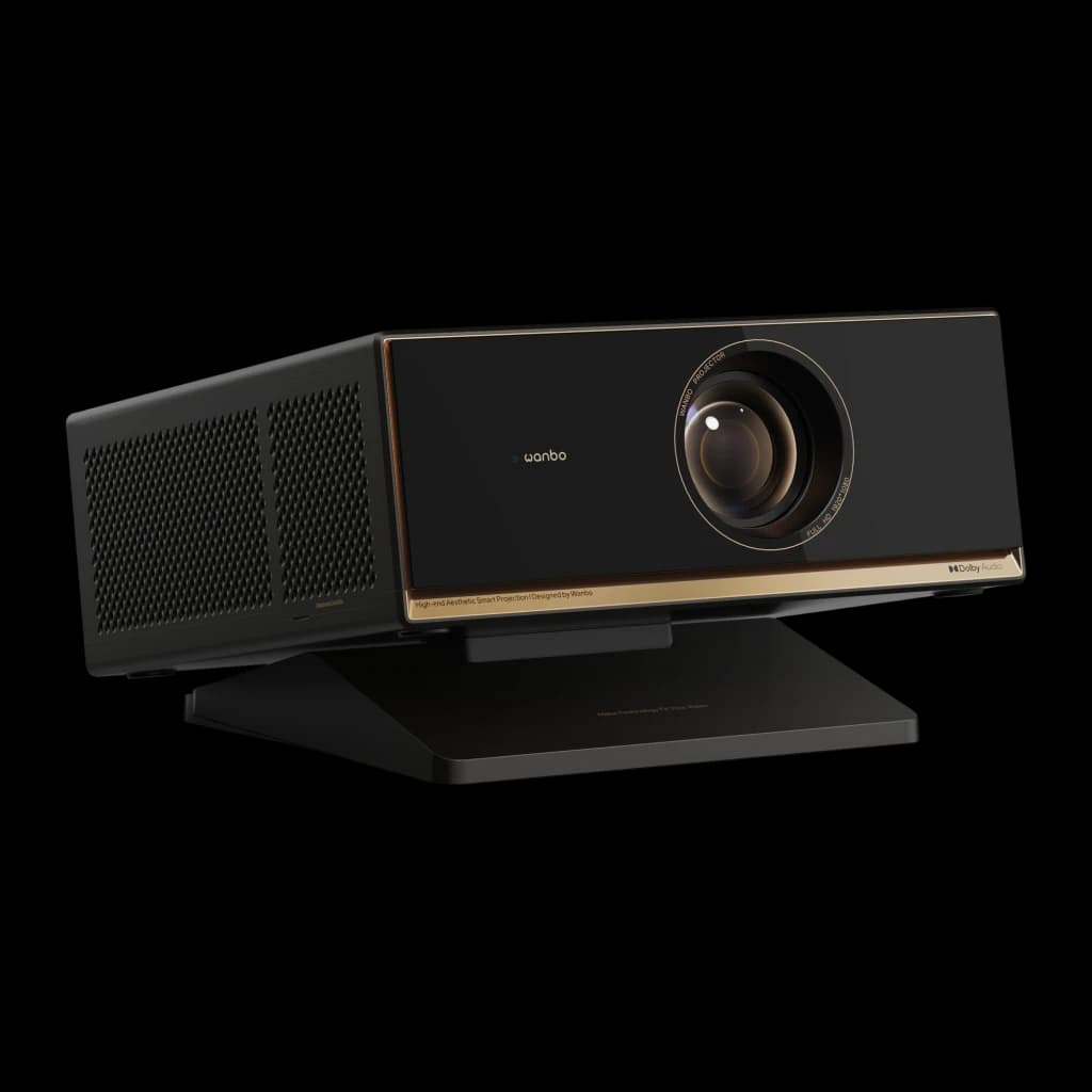 Proyector Wanbo X7 Pro Max 1080p Full HD con lente frontal grande, acabado negro con detalles dorados, rejillas laterales y base inclinada elegante