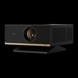 Proyector Wanbo X7 Pro Max negro con acentos dorados, lente frontal grande, panel lateral con rejillas de ventilación y base estable; diseño premium compacto