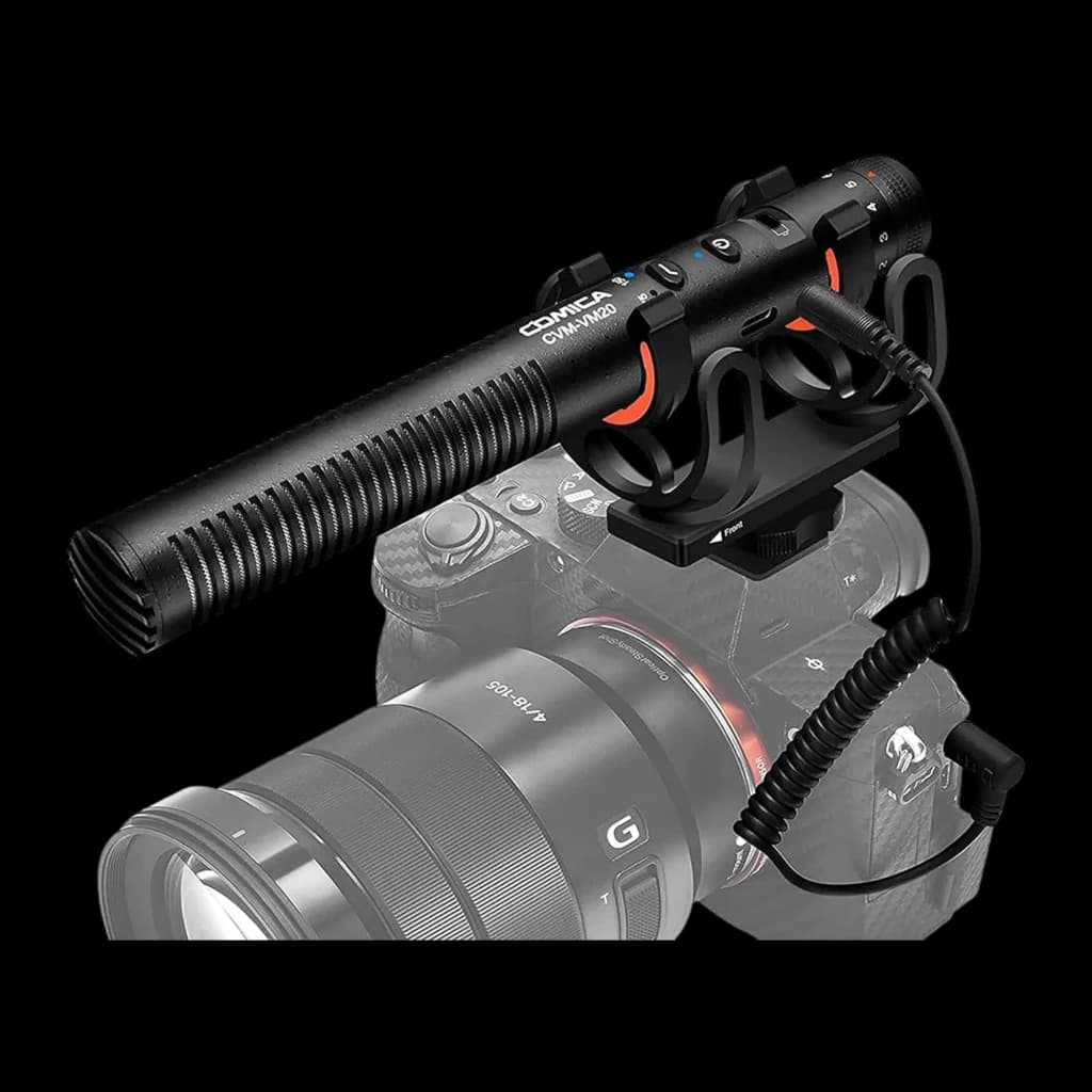 Microphone Comica CVM-VM20 shotgun supercardioïde, corps noir rainuré, monture antichoc avec accents orange, câble spiralé TRS pour caméra réflex/hybride