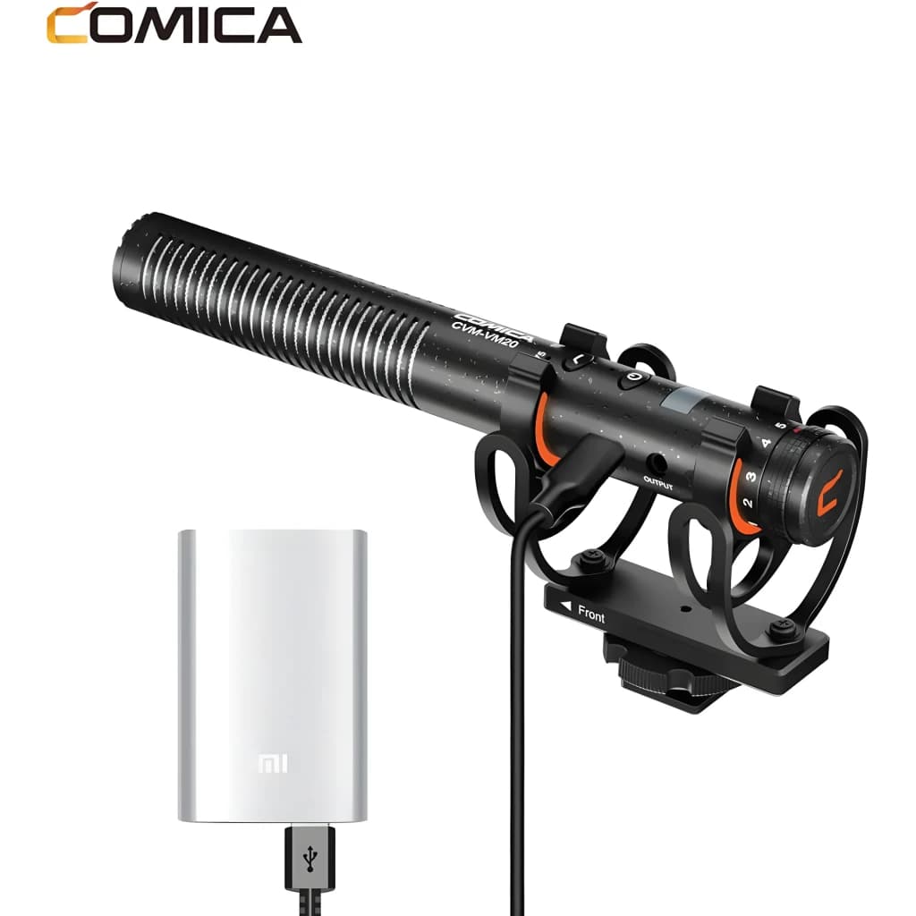 Microphone Comica CVM-VM20 shotgun noir, corps rainuré en métal, monture antivibrations, câble latéral, accents orange, module blanc USB séparé