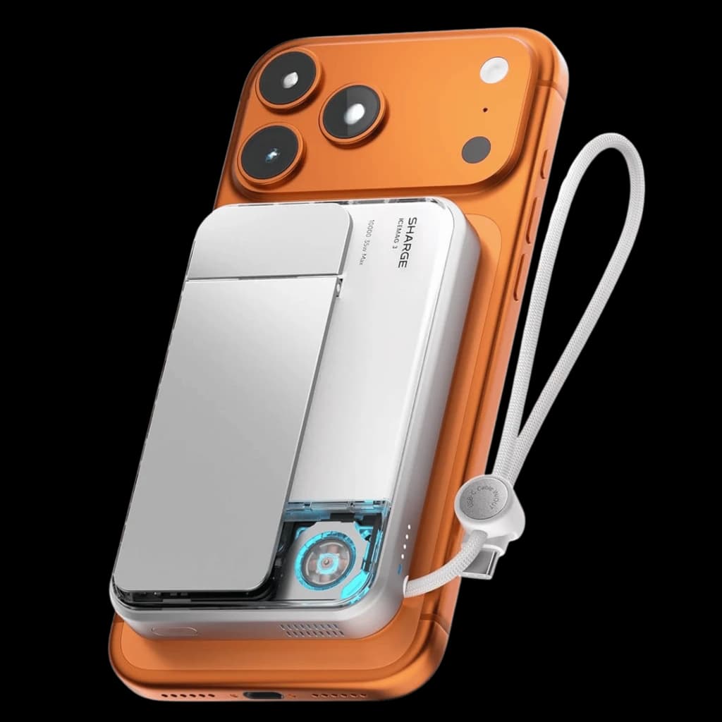 Power bank blanco compacto con imán Qi2, 25W y 10000mAh; ventilación activa visible con turbina azul, tapa metálica abatible y correa de mano ajustable