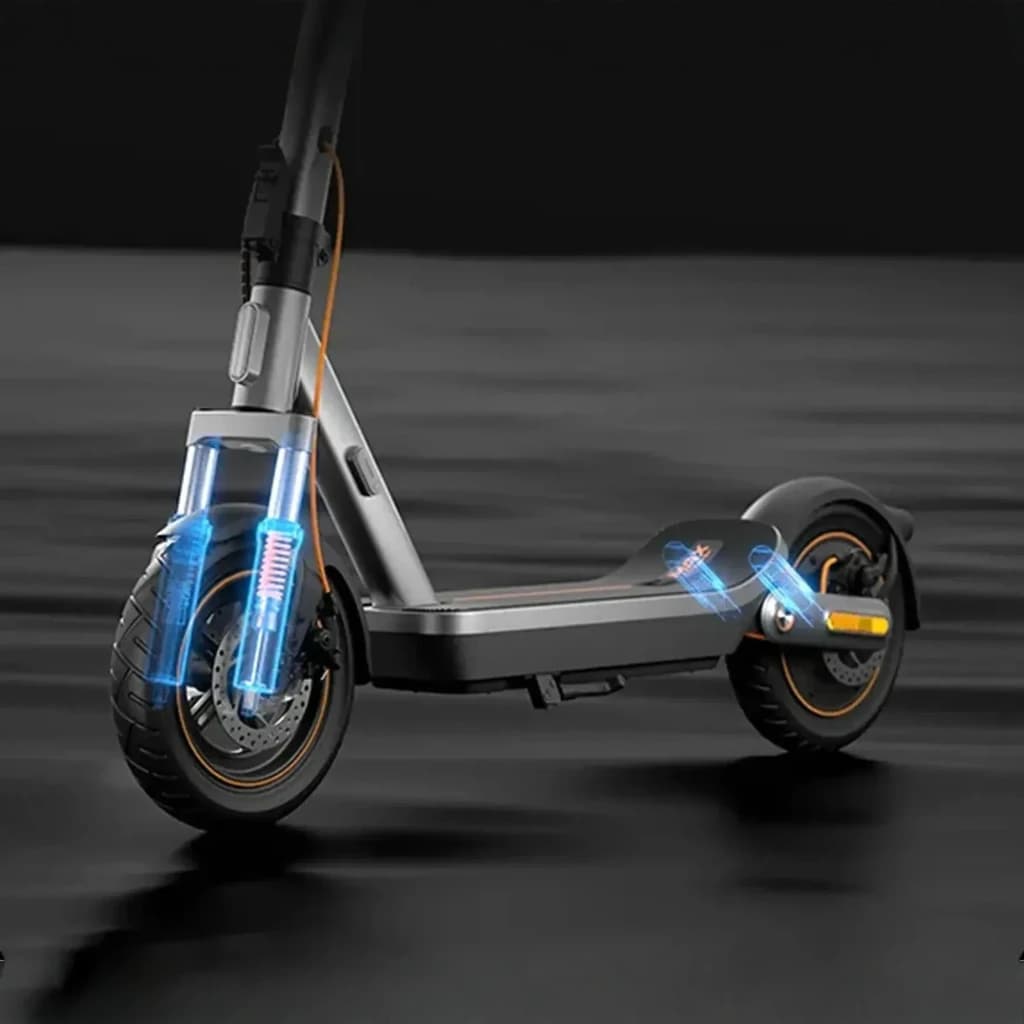 Patinete eléctrico Xiaomi 6 Max con suspensión delantera visible, neumáticos 12 pulgadas, deck ancho antideslizante y freno trasero iluminado
