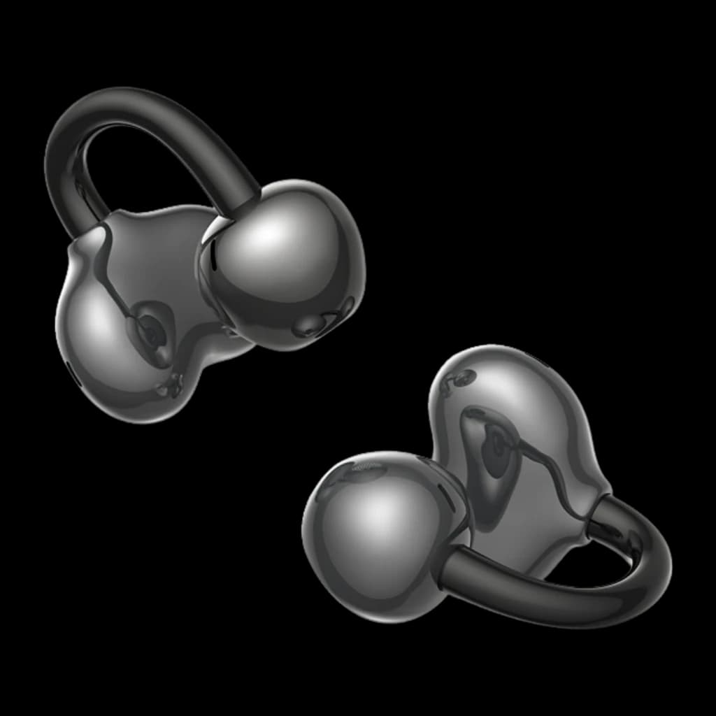 Auriculares Tronsmart OpenFly Clip S1010 Open Ear con diseño clip-on negro, acabado metálico pulido, curvados y compactos, se ajustan alrededor de la oreja