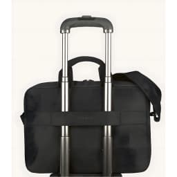 Tucano Global Notebooktasche 15.6-16 noir, vue arrière: sangle trolley glissée sur la poignée d'une valise à roulettes