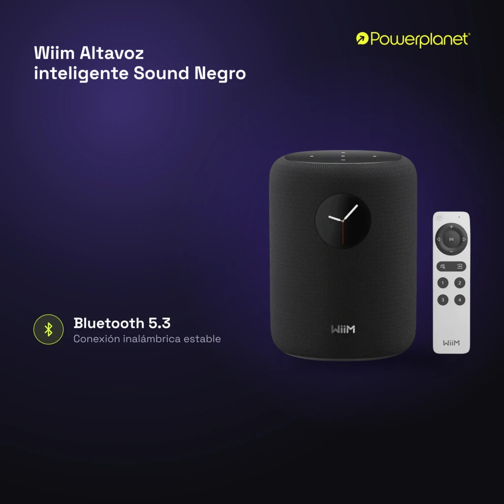 Wiim Sound noir, vue de face: enceinte cylindrique avec affichage horloge analogique et télécommande blanche incluse - Ítem5