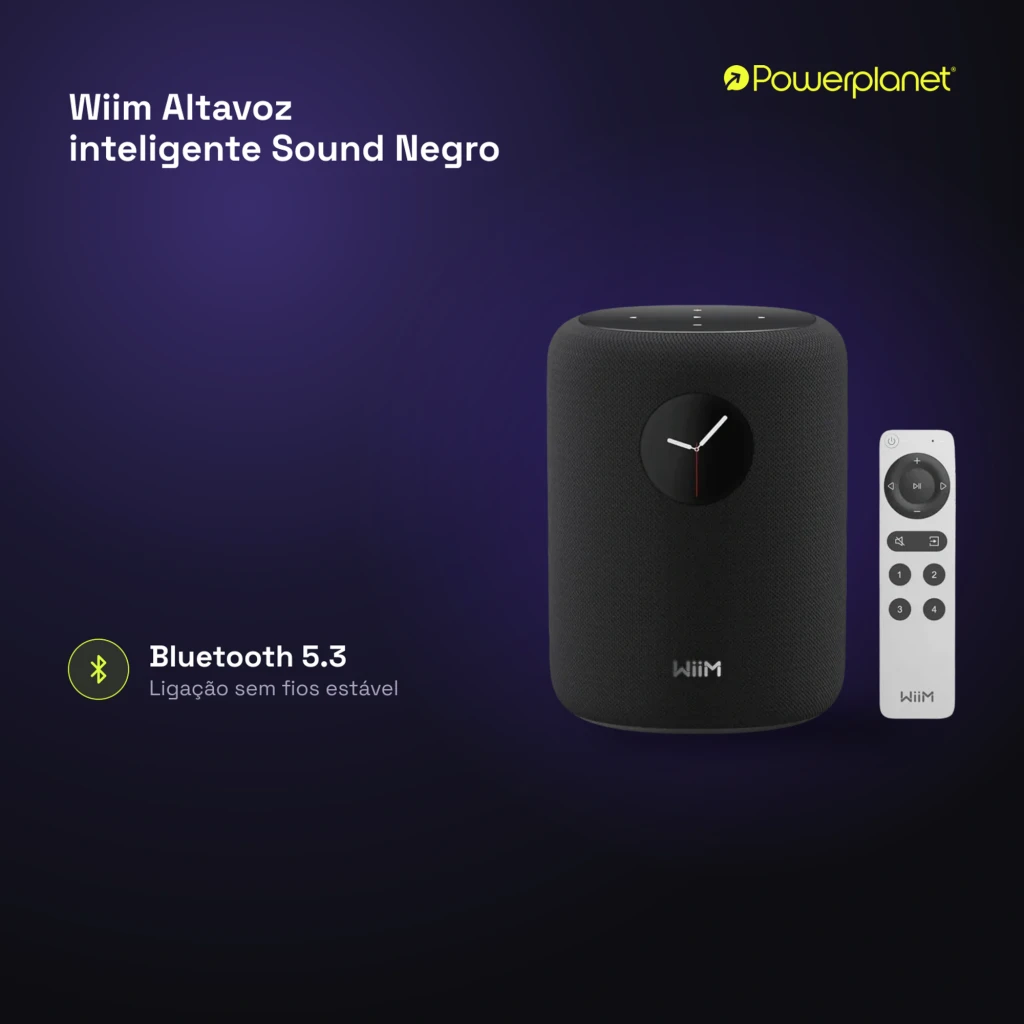 Wiim Sound noir, vue de face: enceinte cylindrique avec affichage horloge analogique et télécommande blanche incluse - Ítem6