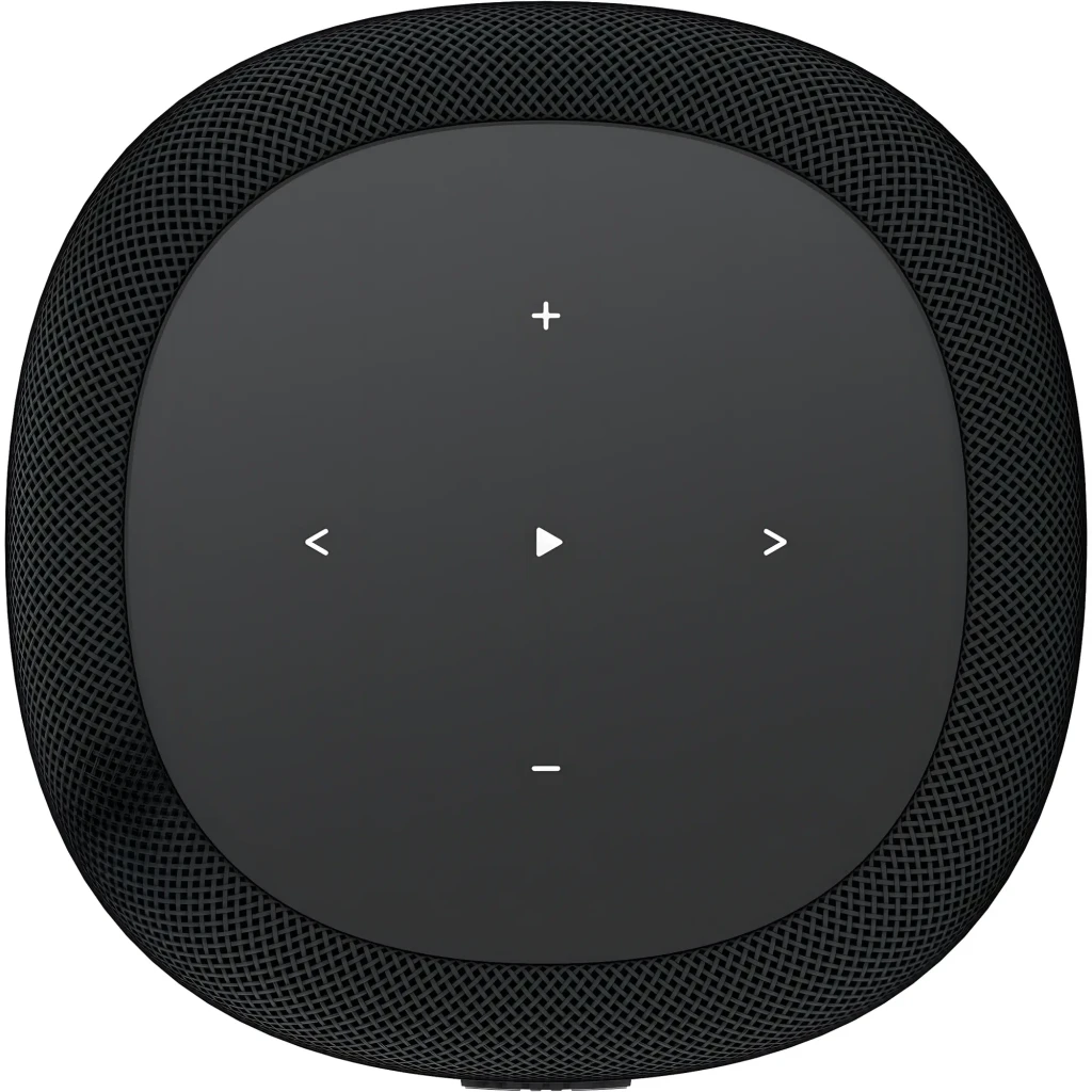 Wiim Sound noir, vue de face: enceinte cylindrique avec affichage horloge analogique et télécommande blanche incluse - Ítem2