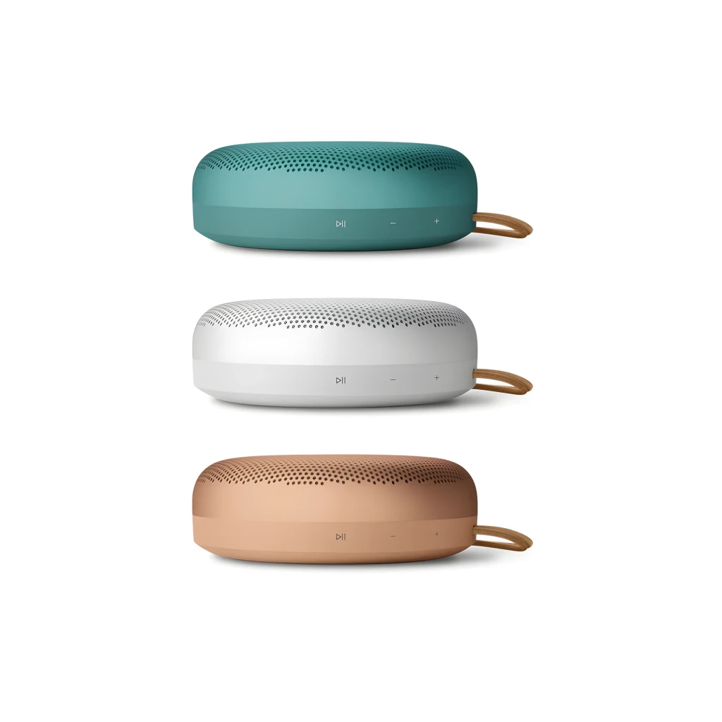 Bang & Olufsen BeoSound A1 3rd Gen Rouge Rustique, vue latérale: grille supérieure, boutons frontaux et cordon cuir beige - Ítem3
