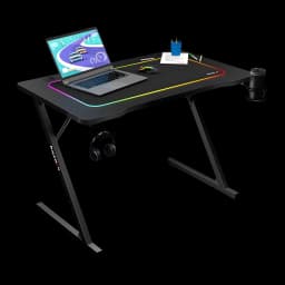 Huzaro Mesa gaming Hero 1.8 Negro, vista en perspectiva: iluminación RGB en borde, patas en Z, portátil, ratón, auriculares