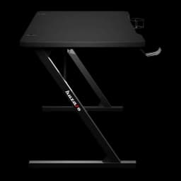 Huzaro Mesa gaming Hero 1.8 Negro, vista lateral: pata Z con logo Huzaro, portavasos y gancho para auriculares visibles