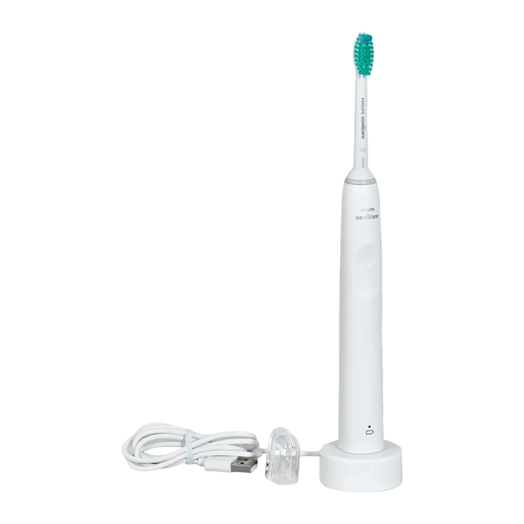Philips Sonicare 2100 Series HX3651/13 blanc, vue de face: brosse sur base chargeur avec câble USB branché et voyant LED vert - Ítem1
