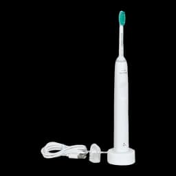 Philips Sonicare 2100 Series HX3651/13 blanc, vue de face: brosse sur base chargeur avec câble USB enroulé sur la surface