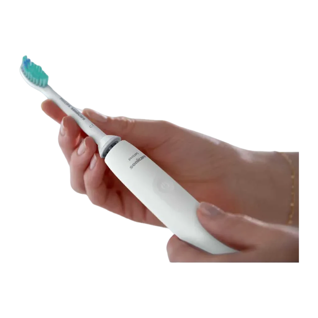 Philips Sonicare 2100 Series HX3651/13 blanc, vue de face: brosse sur base chargeur avec câble USB branché et voyant LED vert - Ítem2