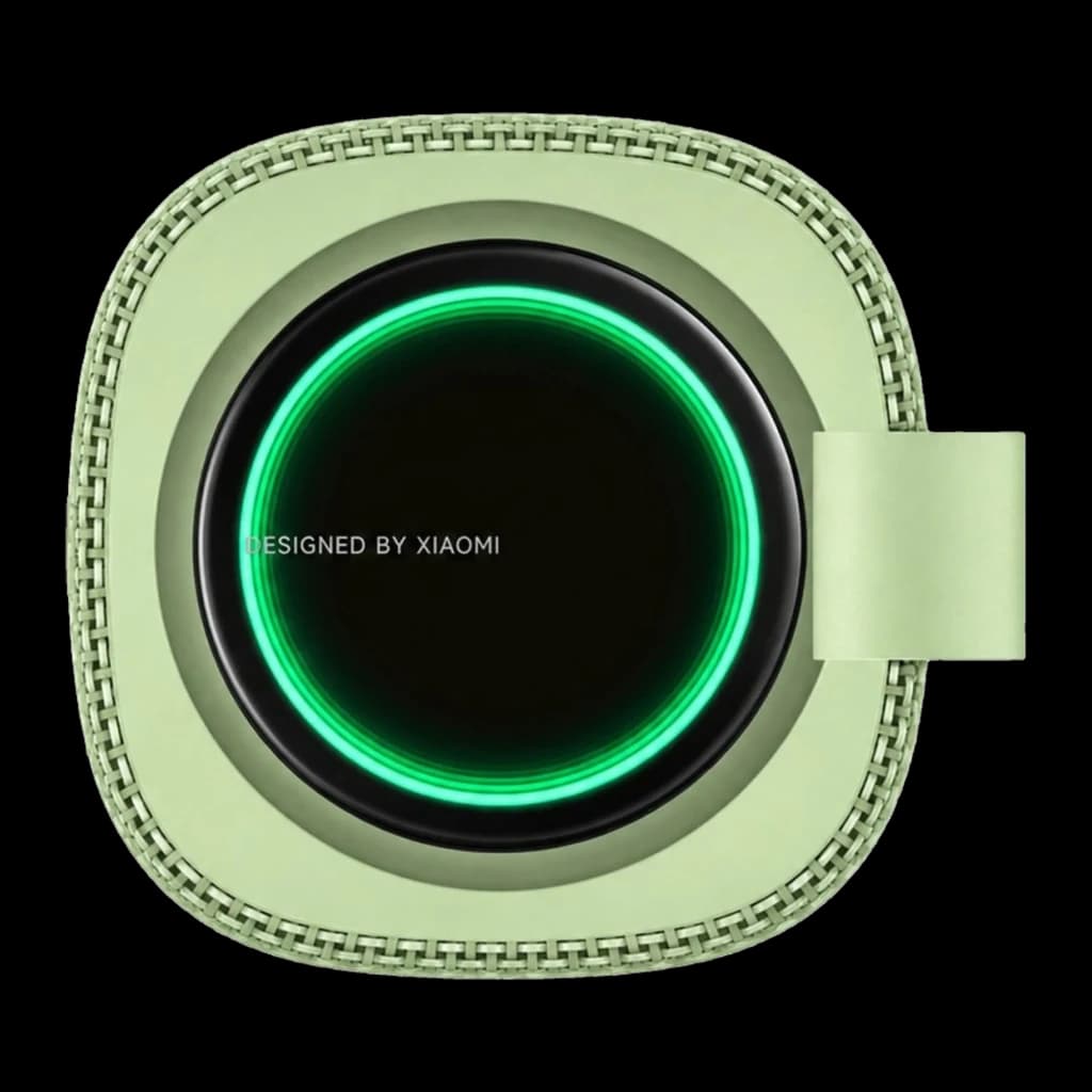Altavoz portátil verde con aro LED luminoso, diseño cuadrado con bordes redondeados y correa lateral; textura trenzada alrededor del marco