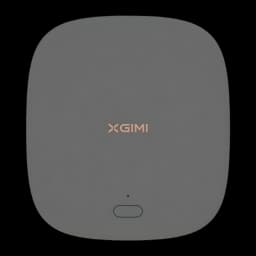 Proyector XGIMI MoGo 2 Pro Gen 2 en gris oscuro, vista superior con logo XGIMI central dorado, botón ovalado frontal y diseño compacto y minimalista