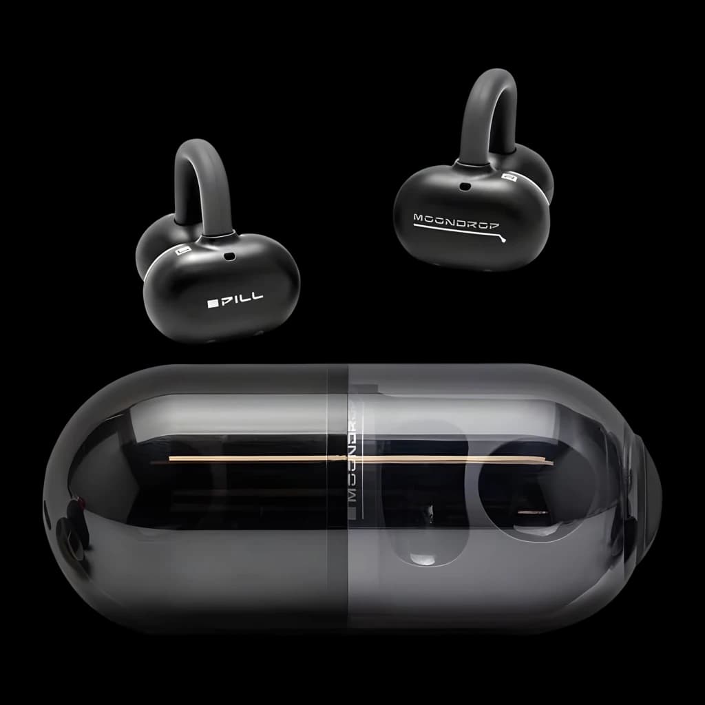 Écouteurs Moondrop Pill OWS noir, design ear‑clip ouvert, boîtier capsule brillant, surface noire mate, logos blancs, courbes compactes et modernes