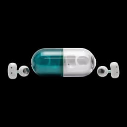 Écouteurs Moondrop Pill OWS Vert avec boîtier en forme de capsule bicolore vert et blanc, oreillettes clip ouvertes compactes et minimalistes