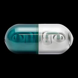 Écouteurs Moondrop Pill OWS Vert avec boîtier en forme de capsule bicolore vert et blanc, design ear clip ouvert, LED discrètes et finition lisse