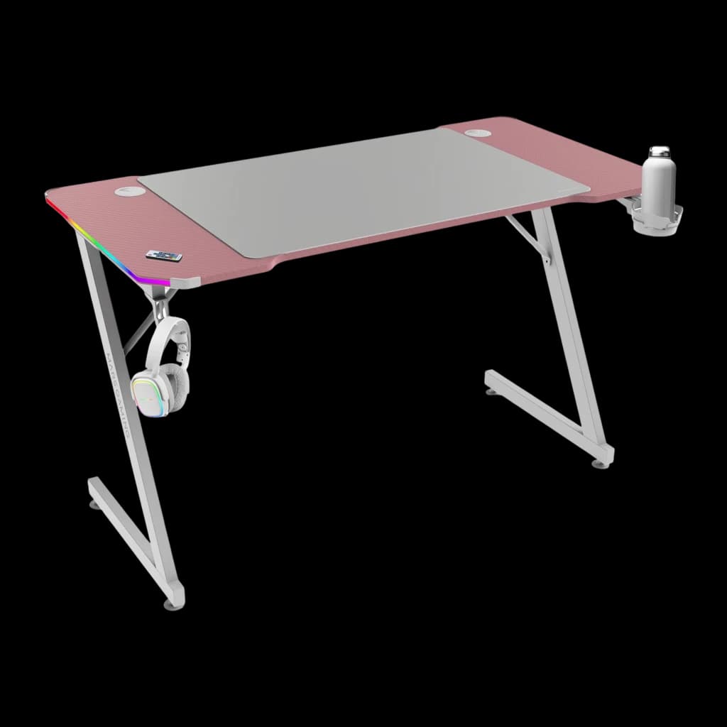 Mars Gaming MGD-X120RGB 120x60cm Rosa, vista 3/4 frontal: superficie rosa con alfombrilla, iluminación ARGB, auriculares