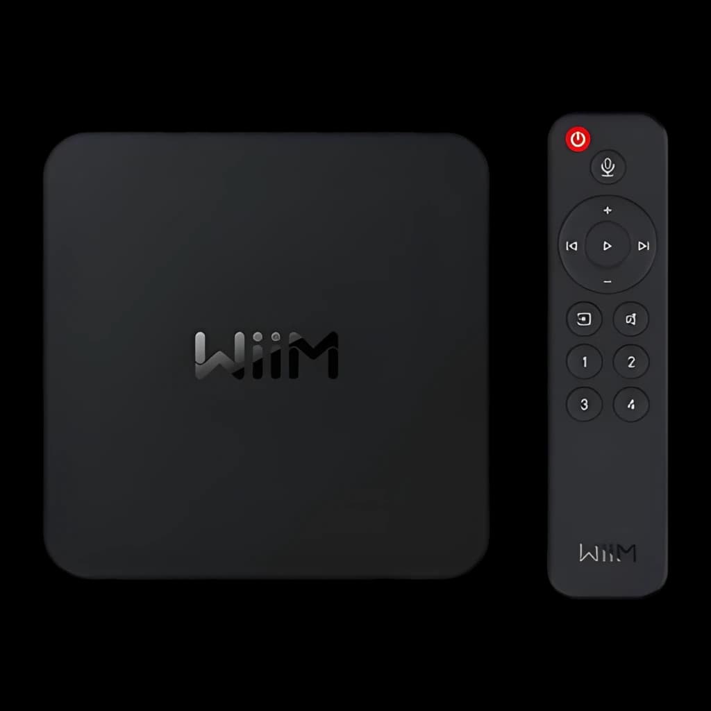 WiiM Pro Reproductor Streaming Negro, vista superior: dispositivo y mando a distancia negro con botón de encendido rojo