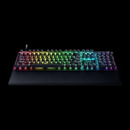 Razer Huntsman V3 Pro Negro, vista frontal en ángulo bajo: iluminación RGB bajo las teclas y reposamanos con logo Razer