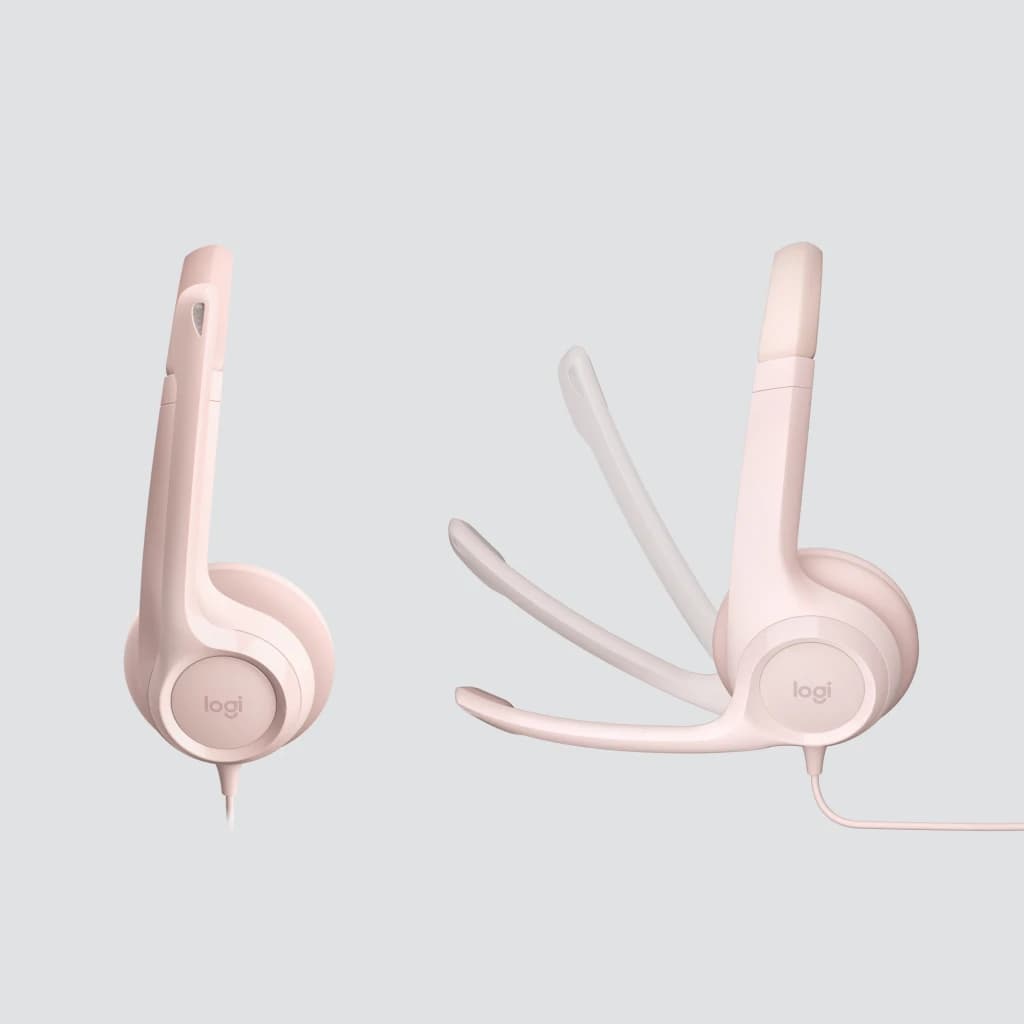 Logitech Auriculares H390 USB Rosa, duas vistas: lateral com microfone dobrado e frontal com microfone estendido