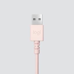 Logitech Auriculares H390 USB Rosa, detalhe: conector USB-A rosa com logo Logi e cabo em primeiro plano