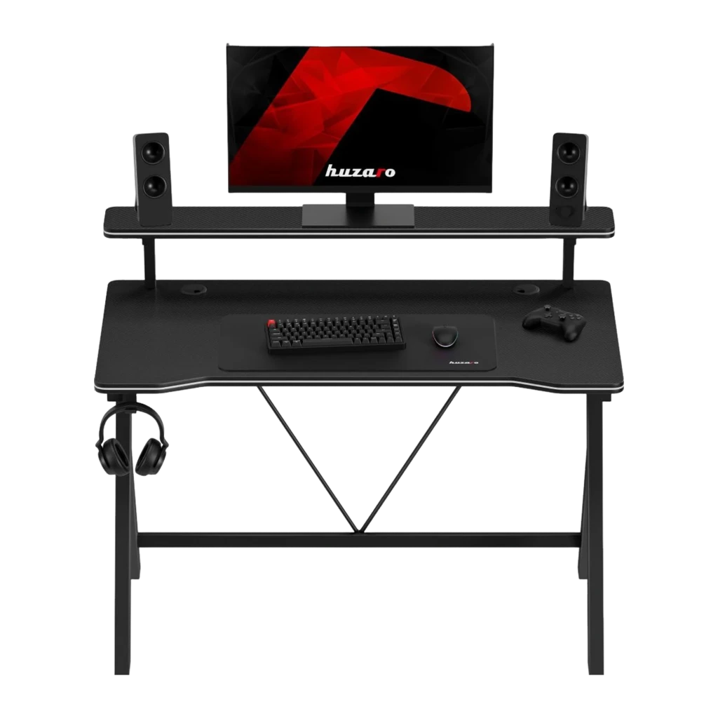 Huzaro Mesa gaming Hero 1.9 Noir, vue en angle: surface carbone, étagère surélevée avec moniteur et enceintes, crochet - Ítem1