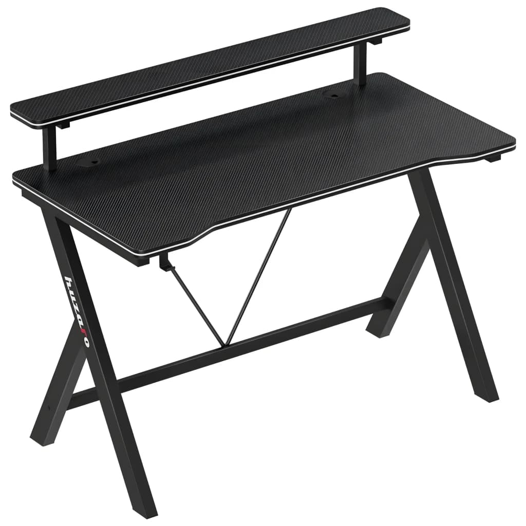 Huzaro Mesa Gaming Hero 1.9 Negro, vista en perspectiva: superficie textura carbono, estante elevado y patas en K metálicas