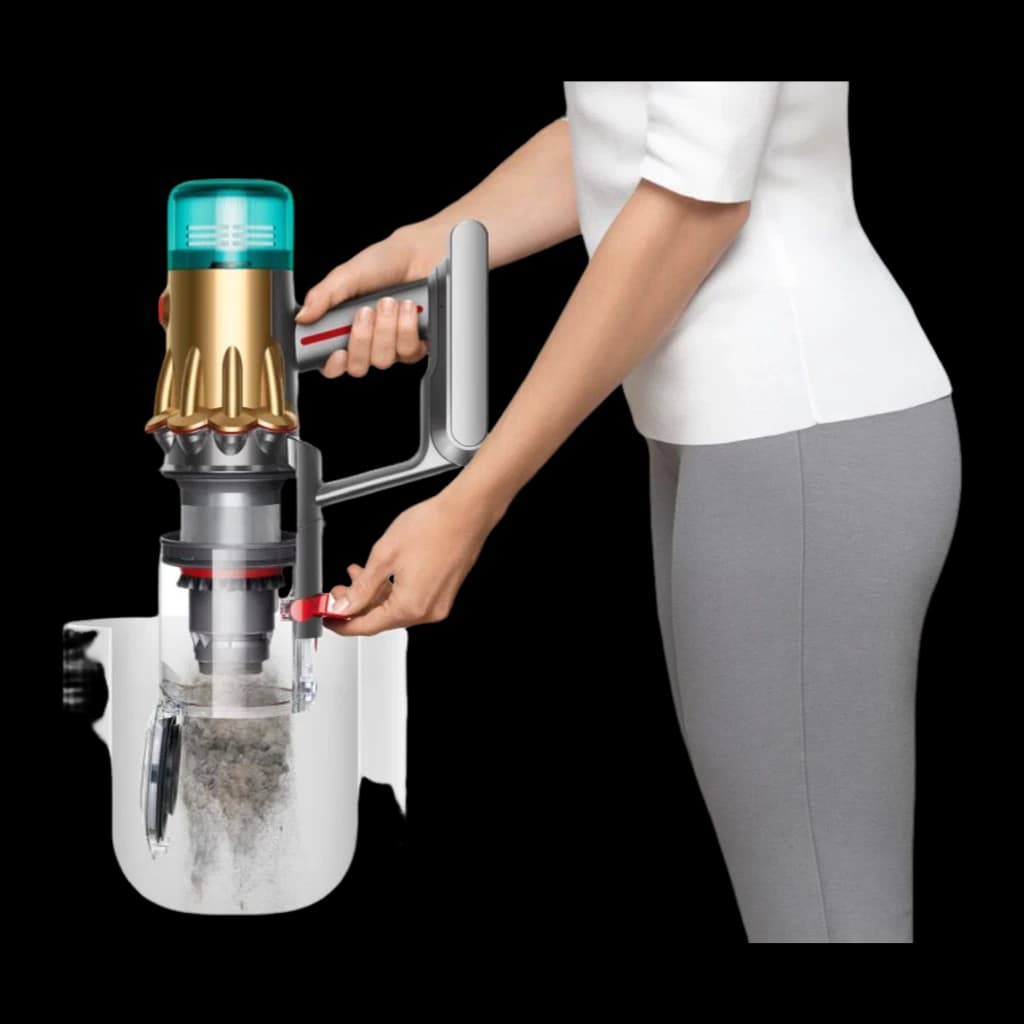 Dyson Aspirador V12 Detect Slim Absolute dourado, esvaziamento: pessoa expulsando sujidade do depósito transparente com