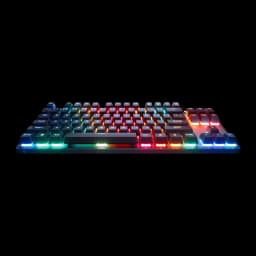 SteelSeries Apex Pro TKL Wireless Gen 3 negro, vista lateral baja: perfil frontal con RGB multicolor en base y teclas