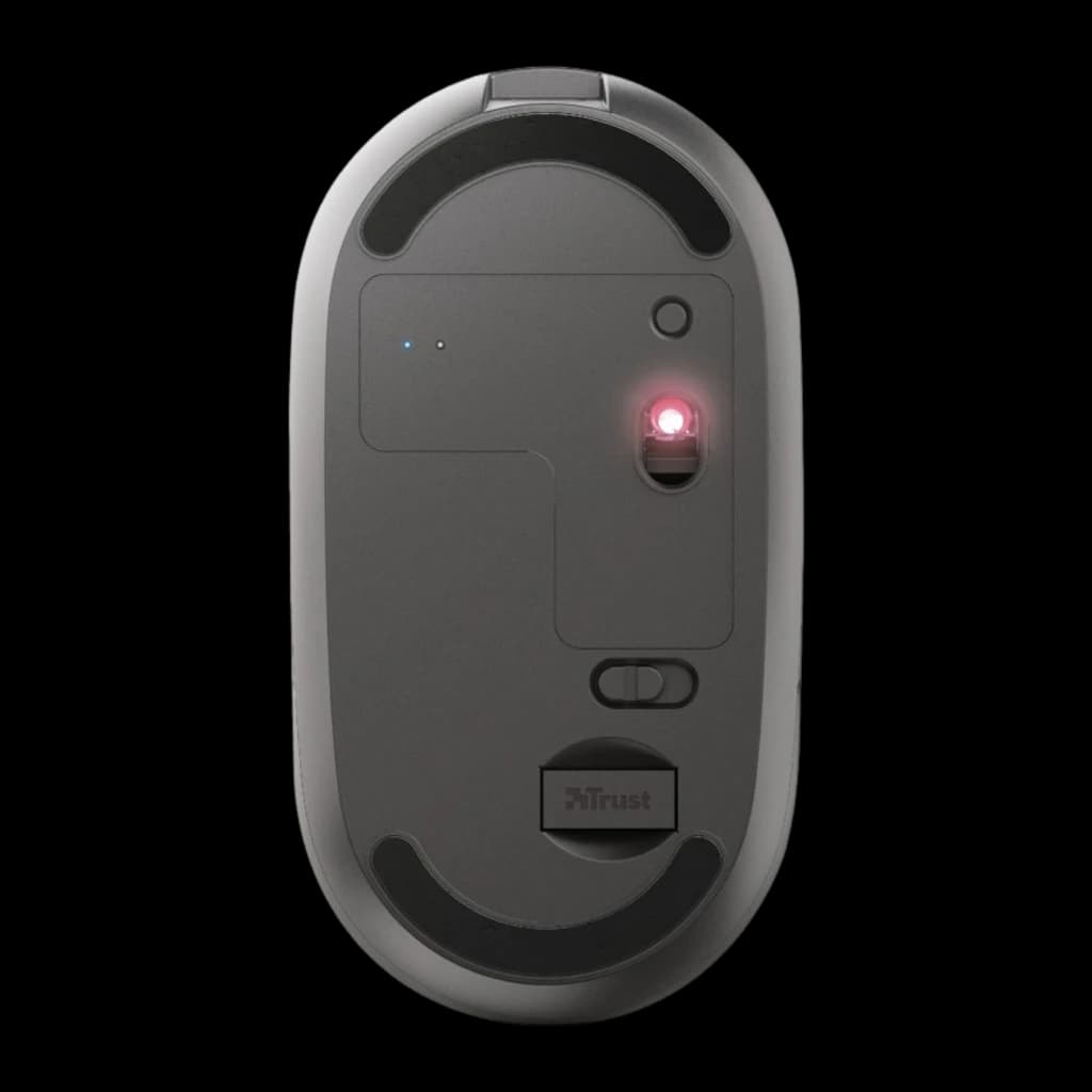 Trust Puck Souris Sans Fil Rechargeable noir, vue inférieure: capteur optique allumé, interrupteur on/off et patins de glisse