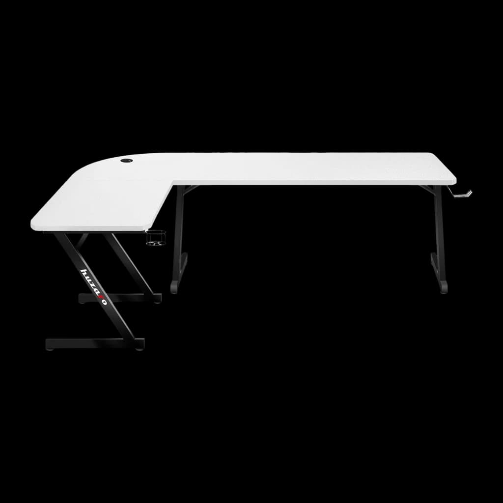 Huzaro Mesa Gaming Hero 7.0 Blanco, vista lateral: superficie en L blanca, patas negras en Z, gancho y gestión de cables