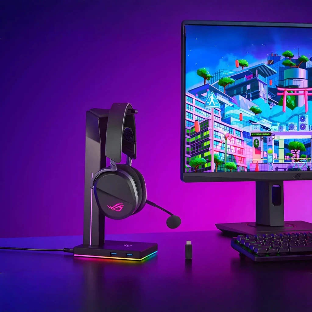 ASUS ROG Pelta Negro, vista principal: auricular inalámbrico negro con logo ROG rosa, micrófono boom y dongle USB - Ítem9
