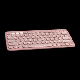 Logitech Pebble Keys 2 K380s rosa, vista em ângulo: teclado compacto com teclas redondas e botões de troca de dispositivo