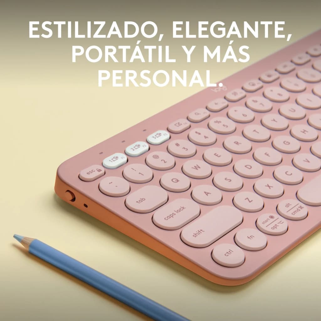 Logitech Teclado Pebble Keys 2 K380s Rosa, vista em ângulo: teclas arredondadas e botões multidispositivo brancos ao lado de