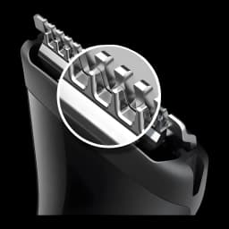 Philips MG1100/16 MULTIGROOM 1000 noir, détail lame: zoom circulaire sur les dents en acier inoxydable du tondeuse
