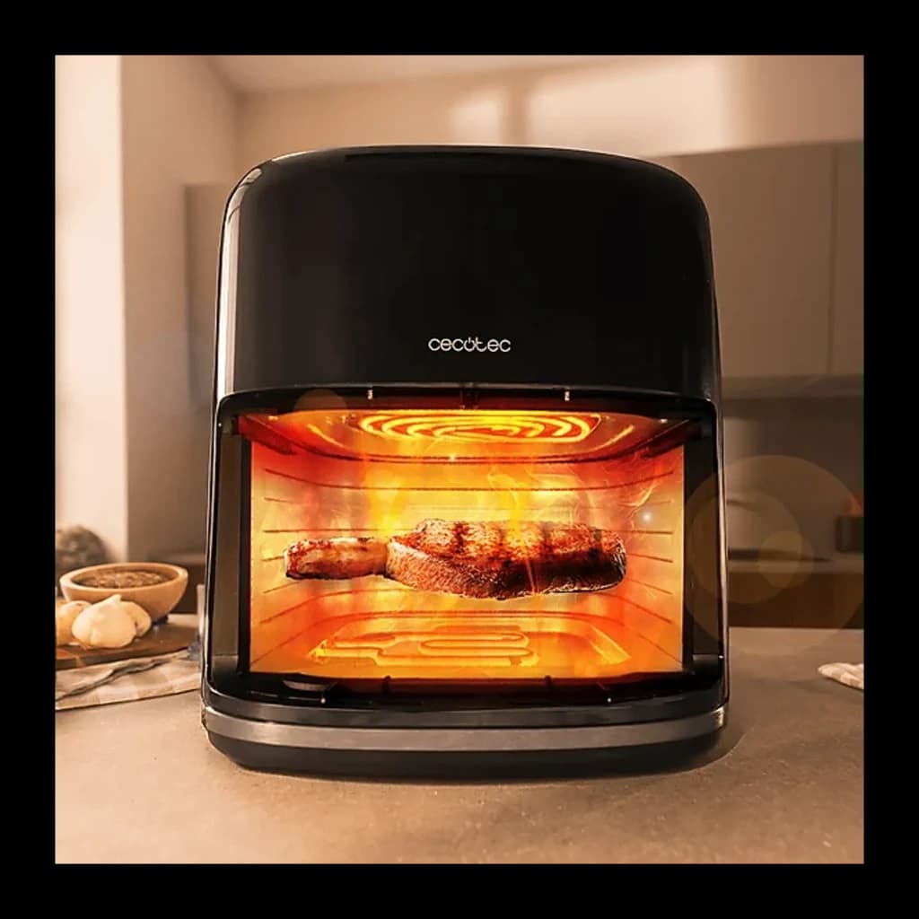 Cecotec Cecofry&Grill Smokin'Prime 6500 6,5L negro, vista frontal en cocina: interior iluminado con carne a la parrilla