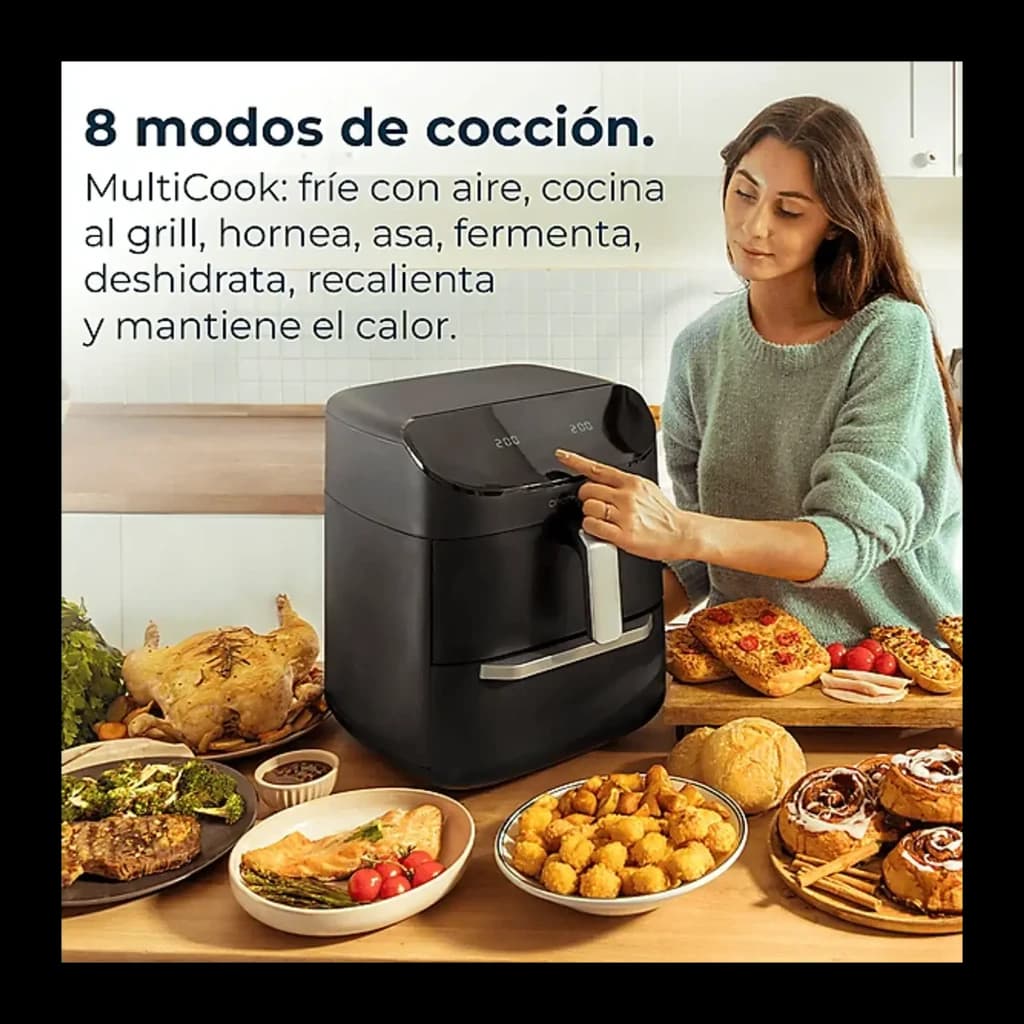 Cecotec Cecofry FoodCourt 11000 Connected Negro, lifestyle: mujer usando la freidora rodeada de platos variados en cocina