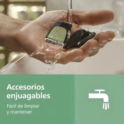 Philips Tondeuse All-in-One 3000 Series MG3935/15 Noir, détail: accessoires noirs rincés sous le robinet dans une main