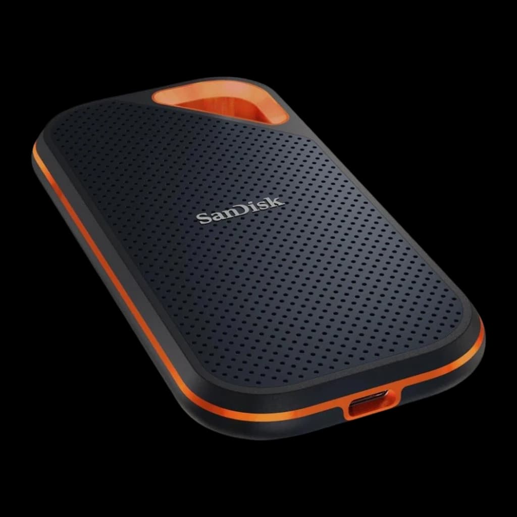 SanDisk Extreme Pro Portable SSD 2TB preto, vista superior em perspectiva: porta USB-C visível na lateral e friso laranja