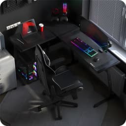Huzaro Mesa Gaming Hero 6.0 Negro, vista aérea: setup completo con silla, monitor, teclado RGB y PC torre