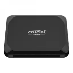 Crucial X9 1TB noir, vue supérieure en angle: logo Crucial by Micron centré, coins renforcés et port USB-C sur le côté