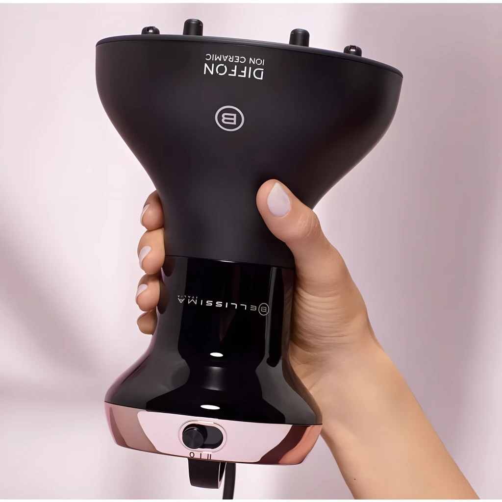 Bellissima Diffon Ion Ceramic 700W preto, vista frontal: corpo ergonómico preto com detalhes dourado-rosé, seletor de - Item3