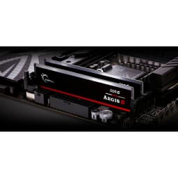 G.Skill Aegis 5 DDR5 64GB Preto, instalada em placa-mãe: dois módulos com faixa vermelha e logo DDR5 visíveis