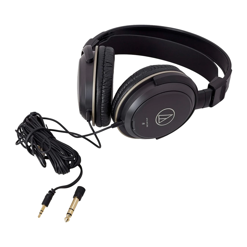 Audio-Technica ATH-AVC200 noir, vue latérale avec adaptateur: casque et jack doré 6,35 mm visible à côté du câble - Ítem2