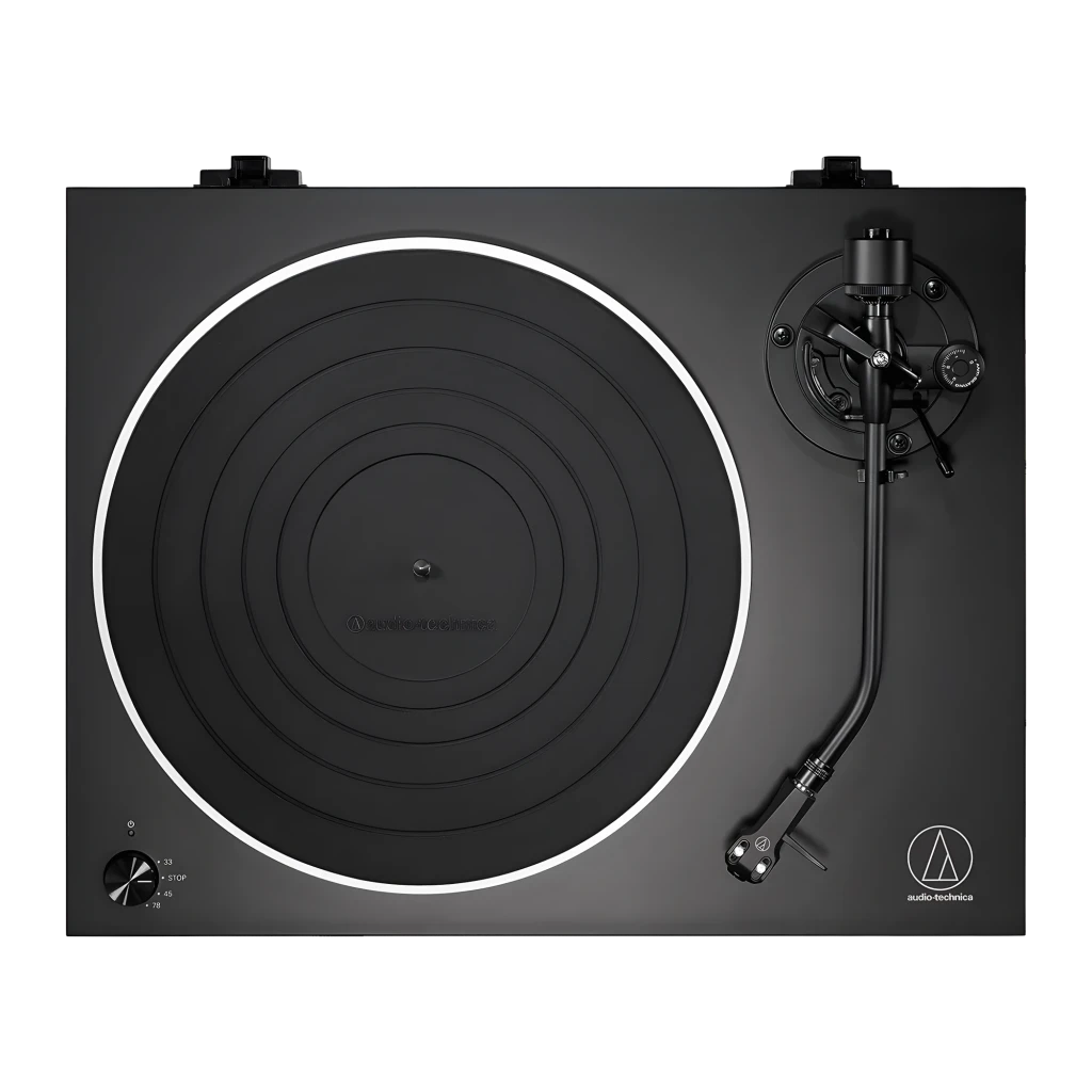Audio-Technica AT-LP5X noir, vue de face en angle: couvercle acrylique ouvert, plateau aluminium et bras de lecture visibles - Ítem2