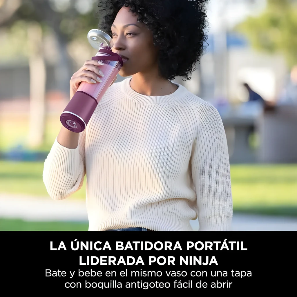 Ninja Blast BC151EU 530ml violet, vue de face: bol transparent avec mangue et glaçons, base avec boutons Start/Stop - Ítem4
