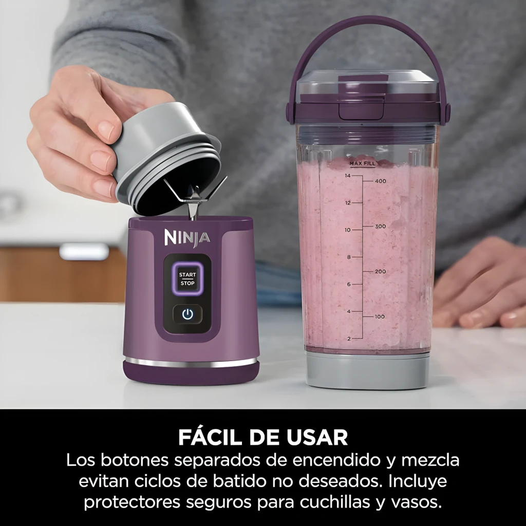 Ninja Blast BC151EU 530ml violet, vue de face: bol transparent avec mangue et glaçons, base avec boutons Start/Stop - Ítem5